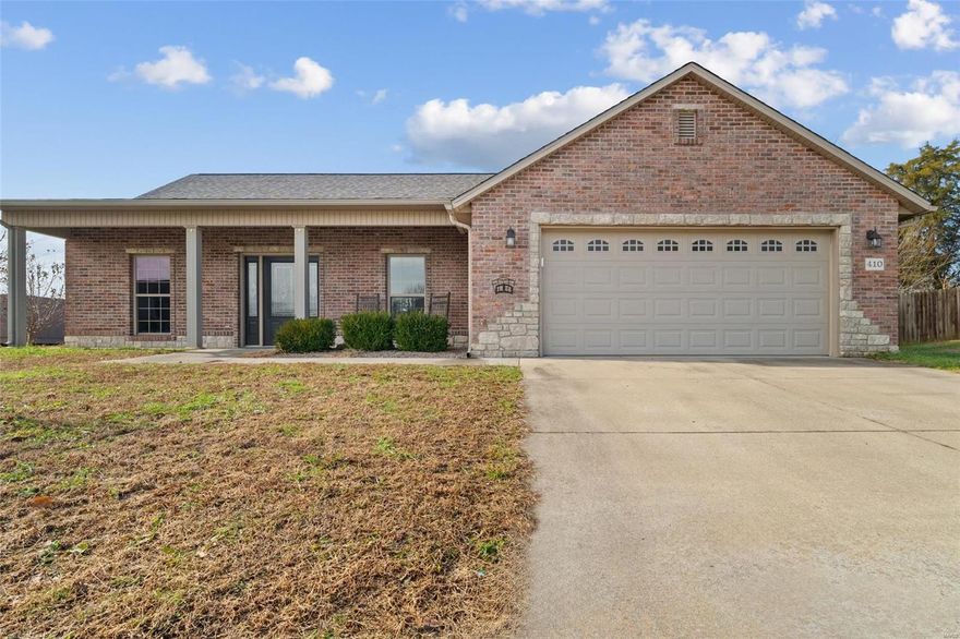 This home is ready for you! Featuring an updated kitchen with brand new quartz countertops, coordinating backsplash and plenty of kitchen cabinet space! Enjoy energy efficiency in this three bedroom, two bathroom slab while also having the security of a built in storm shelter! Neutral colors throughout will lend to any decorating style. Hardwood floors and brand new carpet in the bedrooms, all you need to do is unpack and move in! Enjoy quiet mornings under the covered patio. This home boasts both natural light and recessed lightning! The primary bedroom features a private en-suite with a walk in closet in this lovely divided floor plan! Relax pulling into a two car garage in a quiet subdivision. Schedule your showing today!