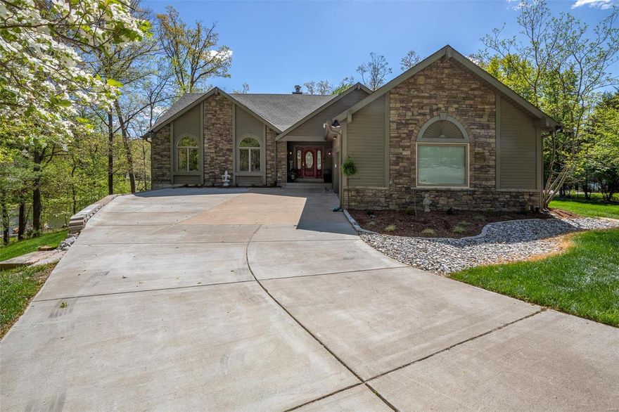 Stunning Dream Lakefront home overlooking Aspenetter Lake & Innsbrook's golf course. Seconds from the main gate, minutes to Lake Aspen boat launch,  Aspen Center, The Clubhouse Bar and Grill, Charrette Commons swimming pool & fitness center.  This gorgeous ranch boasts an open floor plan with hardwood floors, beautiful kitchen with S/S appliances, custom cabinets, large breakfast bar, solid surface countertops, opening to a separate dining area and large great room with gorgeous stone fireplace, vaulted ceilings, tall windows offering stunning lake views & a fabulous extra sitting area wrapped in windows.  The lower level is perfect for entertaining with a large wet bar area,  expansive rec room, stone fireplace, & a huge bedroom perfect for a bunk room. Plenty more areas to entertain on the expanded deck with retractable awnings, large patio, & firepit area.  Professionally hardscaped with waterfall and lakeside dock. Oversized two car garage with plenty of room for a golf cart.