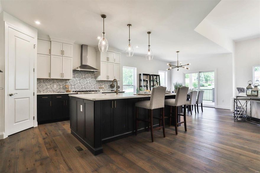 Luxury Low Maintenance Living at its finest! Enjoy a carefree lifestyle and do what you love! This Story & half home features Main Floor Master Suite and Office with Two Bedrooms up with full en-suite private baths! Open floor plan w/Great Rm/Brkfast Rm and Large Kitchen with oversized island. The kitchen is gorgeous with Designer Upgraded Cabinetry & Quartz Counter Tops included.  Master suite has plenty of storage with a walk in closet.  Master bath features a separate free standing tub and a tile walk in shower w/seat. Secondary Bedrooms are oversized and comfortable! Partial Finished Basement includes a Rec Rm, Bedroom, and Full Bathroom. It has the added benefit of lawn & landscaping maintenance, in ground sprinkler system, & snow removal. Easy access to schools, shopping & freeways! Come by & see! Annual HOA also applies.