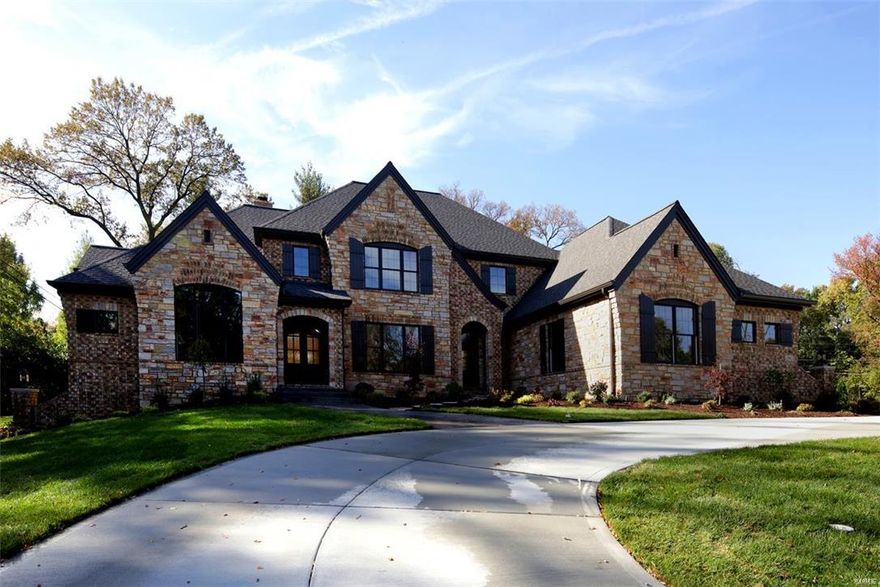 Just completed!  New custom home by Dublen on 1.4 -acre secluded wooded site in the heart of Ladue, situated across from two newer homes and directly next door to another new home under construction on a 1.4-acre site on Lot 3.  Builder has sold a newer home at 2 Briar Oak and has completed and SOLD other homes nearby in the past couple of years at 2 Romany Park, 3 Romany Park, and to the rear of 2 Briar Oak at 5 Tamarack Lane.  Loaded with upgrades--walnut wood floors, outside covered porch with fire-pit, gourmet kitchen with Quartzite center island countertop and Thermador stainless appliances, pot filler, True wine and beverage coolers, warming drawer, 4 sided brick exterior, first and second floor laundry, and luxury master bath with huge walk-in shower and custom closets.  3 fireplaces, 4 -car garage.   Notice the custom cabinets and wood bookcases, step up family room on upper level, and luxurious millwork.  Welcome Home!