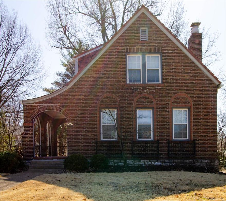Gorgeous Brick Home with so much charm!  Located in walking distance from UMSL! You will fall in love with the covered front porch and original wood door with leaded glass features.  When you step inside the wood floors, picture trim, original stained glass windows and gas fireplace will immediately make you want to call this beauty your home!  Kitchen with stainless steel appliances, some glass doors in cabinets, and a corner cabinet in the nice mudroom/entry.  A large dining room with wood floors rounds out the first floor.  On the second level there are three bright bedrooms with wood floors and a bathroom with lovely custom tilework floor.  There are nice sized closets and a upper level deck.  Laundry and storage area in the full, walkout basement.  Level lot with 2 car detached garage.  Covered patio to enjoy the summer evenings! This home is ready for you to move in!  Call today and start packing! Additional Rooms: Mud Room