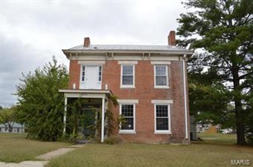 If these walls could talk!  Built in 1854, this home is listed on the National Historic Registry (ID#99000664), and was formerly known as the Dr. J.A Hay Home, who was a friend of President Lincoln's.  A charming 2.5 story brick on an oversized corner lot, it offers over 2500 total square feet of living space, an updated attached garage, corner lot, and a great view of the city park across the street.  The home is vacant and in need of some TLC, but upon improvements would make a stately home.  A new central air unit was installed in 2005, and most of the older windows have been replaced with new double pane windows. SpecialListingConditions: Foreclosure Additional Rooms: Mud Room