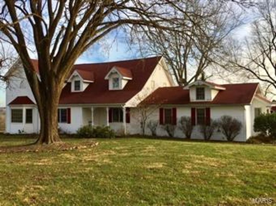 LOOKING FOR A NICE HOBBY FARM?  THIS AMAZING FARMHOUSE WITH 5 BDRMS, 3 BATHS, & TWO 1/2 BATHS BOASTS LOTS OF CHARM & CHARACTER!  THIS ATTRACTIVE PROPERTY WITH 19 ACRES M/L ALONG WITH SPECTACULAR VIEWS HAS SO MUCH TO OFFER.  DISPLAYS 2 PONDS, A BARN, & SEVERAL OUTBUILDINGS ALONG WITH NICE PASTURE & FENCING.  THIS EXPANSIVE HOME HAS AN ABUNDANCE OF CHARM & CHARACTER DISPLAYING BEAUTIFUL HARDWOOD FLOORING + 2 FIREPLACES.  LARGE MAIN FLOOR MASTER SUITE WITH JETTED TUB, SEPARATE SHOWER, & DOUBLE SINKS.  FRONT STAIRCASE OVERLOOKS LARGE LIVING ROOM FROM UPSTAIRS OFFICE AREA THAT DISPLAYS A LARGE BOOKCASE & GORGEOUS STAINED GLASS WINDOW.  ALSO, THERE IS  A MAIN FLOOR FAMILY ROOM WITH ANOTHER STAIRCASE TO UPSTAIRS.  NICE CLAWFOOT TUBS IN SOME BATHS.  BASEMENT PARTIALLY FINISHED WITH WALKOUT, REC ROOM WITH 2ND FIREPLACE, SHOWER, & PLENTY OF STORAGE.  PROPERTY OFFERS SOMETHING FOR EVERYONE AND PERFECT FOR YOUR FARMHOUSE DECOR.  CALL TODAY TO SCHEDULE A TOUR OF THIS PRICED TO SELL PROPERTY!