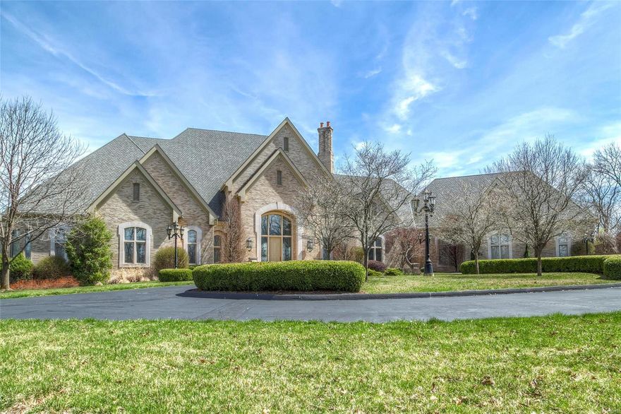 This magnificent ranch featuring over 14,000 sq ft of living space epitomizes the setting and lifestyle of a country estate! Stunning 20’ foyer with exquisite crystal chandelier leads to elegant dining room & spectacular great room with floor-to-ceiling marble fireplace, wet bar & wall of windows with breathtaking views of the lake & surrounding hills. State-of-the-art kitchen featuring commercial grade appliances adjoins sunlit breakfast room & hearth room highlighted by granite fireplace. Sumptuous master bedroom suite with custom built-ins & marble fireplace plus 2 bedroom suites & private study complete the main floor living quarters. Lower Level includes recreation room with 2nd kitchen, game room, workout room & 2 additional bedroom suites. 2nd staircase accesses spacious guest quarters. Grounds include expansive deck, patio, 4-car garage & carriage house with 4 additional parking spaces. Tucked away in a perfect location on 196 scenic acres with abundant wildlife & 22-acre lake.