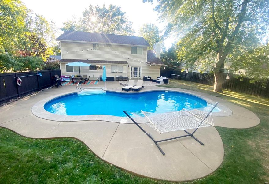 * THIS Home is for ENTERTAINING! * BIG, Private FENCED Yard w/ In-ground Saltwater POOL (New Pump & Salt Cell 21) on Corner Lot w/ Mature Trees, Paver Patio & Retaining Wall * Newly Updated Kitchen w/ New Soft Close Shaker Cabinets (19) w/ Under Cabinet Lighting * New Quartz Countertops (19) * New Farmhouse Sink (19) * New Pantry w/ Pull-Out Drawers (19) * New Banquette Nook (19) * New Porcelain Tile Backsplash (19) *  Stainless Steel Appl w/ FRIDGE! * Built in Micro * Cozy Family Room w/ Elegant Wood Ceiling w/ Canned Lighting & Updated Woodburning Fireplace w/ New Refractory Panels (19 )  * First Floor Has NEW Coretec Virtue Oak Luxury Vinyl Plank Flooring (19) * New 50 Gallon Water Heater (20) *  New Presidential Shingle Roof (18) * Master Suite w/ Separate Jetted Tub & Shower, Bay Window & Walk-in Closet * Lower Level Rec Room * Bay Windows * Storage Shed * Brick Mailbox ** Popular MEADOWRIDGE Subd w/ Community Pool, Pond & Clubhouse * Walking Distance to Veterans Tribute Park  *