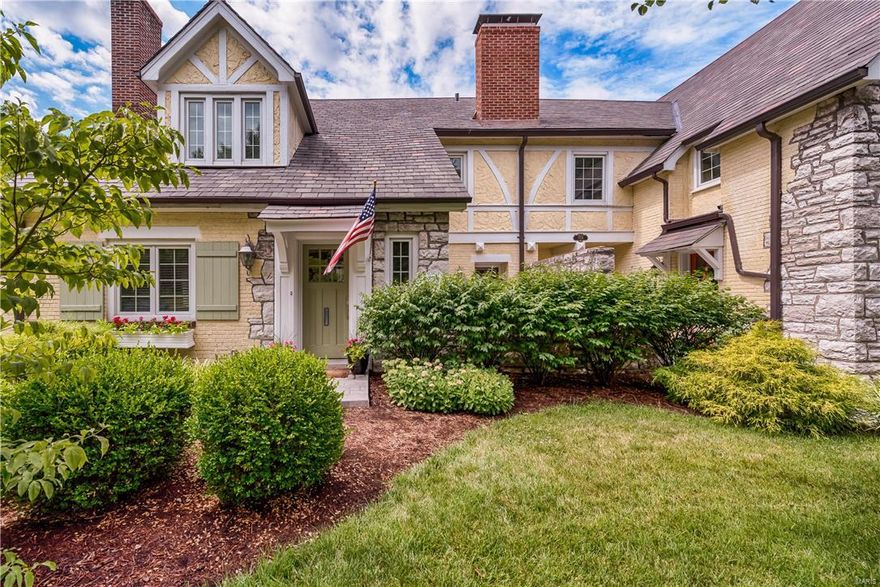 Architecturally rich with finishes to match, this stunning Davis Place home is IT.  The interior of this original 1926 structure was entirely re-imagined and re-built in 2008. Spacious main-level with wood floors, moldings, and built-ins. Large LR with stone-surround fireplace opens to separate dining. The kitchen is the place to be, whether you are dining at the tiered center island, or serving drinks from your built-in bar area. Glass cabinets, stainless, pantry area, and access to two separate patio areas will make your friends jealous. The upper level boasts 2 bedrooms including a master suite you will want to spend all day in, complete with vaulted ceiling, sitting room, walk-in closet with organizers, and gorgeous bath. Additional living space in the finished, walk-out LL that also offers a light-filled laundry and extra storage. Plantation shutters, zoned HVAC, garage parking, stamped concrete patios, fully-fenced yard with lush landscaping, and more. Prime location in Clayton. Location: End Unit