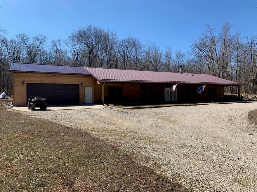 This one is a beauty you won't see often!!  This home offers a huge open floor plan with over 2200 sq. ft of living space. Wood burning fireplace, some new flooring, stunning cherry maple cabinets, marble kitchen flooring, tilt in wood windows, 80 gallon energy star hot water heater, 2 jacuzzi tubs, farmhouse kitchen sink, master suite with a walk in closet, master bath includes a jacuzzi tub and separate shower & double vanity. There are two more rooms with closets currently being used as bedrooms (no windows but both have skylights). You will love the front porch which extends the entire front of the home.  Owner recently added an oversized 30x40 two car attached garage that is set up with work benches and LED lighting with side entry into the utility room.  Home is located on 20 acres that is fully fenced located at the end of Dubay with lots of privacy!! SELLER IS MOTIVATED!!!