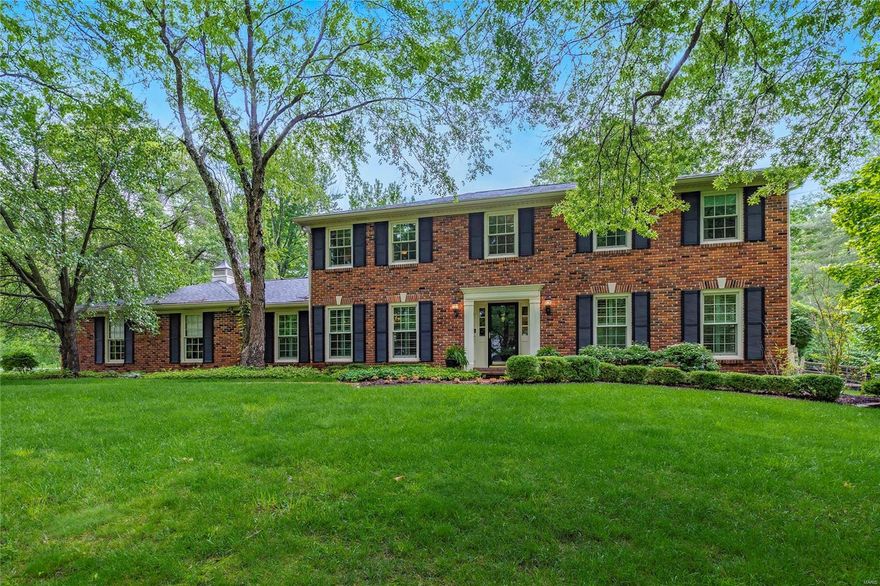 Charming 2-Story on a wooded .67-acre lot in the Heart of Creve Coeur! 4 Beds, 3.5 Baths, with over 4000 square feet of living space including the finished LL. Main Floor boasts a functional & open floor plan: formal Dining, Living Room with custom built-ins & awesome Family Room with a gas FP flanked by built-ins & wet bar. Gourmet Kitchen with custom cabinets, granite, center island/bar, walk-in pantry, SS appliances & adjoining Breakfast Room. Main Floor Laundry/Mud Room. Spacious 2nd Floor finds wonderful Master Suite with custom walk-in closet & gorgeous Bath with double vanity, make-up area; & large custom tiled, multi-head, walk-in shower with built-in bench/storage! Highlights: newer roof, zoned HVAC, wood floors, crown molding, plantation shutters, recessed lights & O/S rear-entry 2-car garage! LL with Rec Room, stone fireplace (gas), custom wet bar, built-ins, pool table/game room, walk-in cedar closet & 3rd full Bath. Fabulous inground pool - amazing for entertaining!