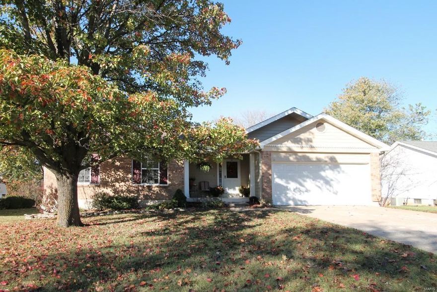 Well maintained 3 bedroom ranch, with 4th sleeping area, and 2,071 TLA, in Harvest Estates. Notice the well landscaped yard, covered front porch and large level fenced lot with shed; lawn mower included. Enter into an open and flowing floor plan. This includes a great room with gas fireplace and vaulted ceiling, eating area, and kitchen. Formica counters (2014), plank laminate and numerous white cabinets. Master suite with new carpet (2015), walk-in closet & full bath with new tile (2015). Bedrooms include ceiling fans and 6 panel doors. First floor laundry including washer and dryer. Finished lower level includes a spacious recreation area, ½ bath, and sleeping area with new carpet (2015) and windows. Lots of storage with built-in shelves and sump pump. Enjoy the outside in the 200 sq. ft. screened porch. Exterior includes roof replaced (2011), soffit and fascia replaced (2014), and wood areas painted (2012). Great location near schools, shopping, I-94/I-364, and the Katy Trail.