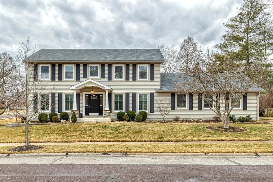 This beautifully updated 2 story is the only home in Dougherty Estates with a huge, oversized 3 car garage (840 sq ft)! This charming home begins with a newer custom front porch, new windows throughout and gorgeous hardwood flooring with base molding on the main level. Updated kitchen has an abundance of white cabinetry, granite counters, center island and glass door pantry. Gracious living and dining rooms have Plantation shutters and adjoining family room has built in cabinetry surrounding the woodburning fireplace. Steps away from kitchen you’ll find the large, vaulted 3 season room which is additional entertaining space and exits to beautifully landscaped yard. Plus, lower level finish includes a newer bath, enough space for exercise and relaxation areas, newer luxury vinyl flooring and custom wet bar. Large master bedroom suite with walk in closet and 3 nicely sized bedrooms share the updated hall bath. Plus, newer Roof (2015) and newer Furnace (2016)!