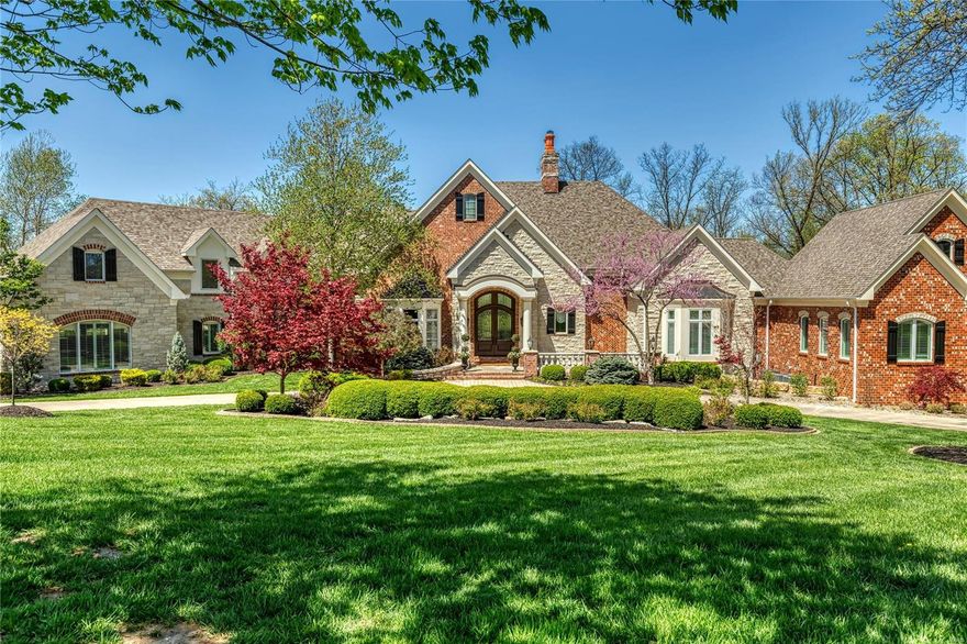 Magnificent 10,000 sf European-inspired Estate home. Impressive foyer highlighted by architectural columns opens to elegant dining room & stunning great room with 14’ box beam ceiling, stone see-through fireplace, wet bar & 2-sty bow window. Designer kitchen with vaulted ceiling with timber beam trusses, granite countertops & commercial grade appliances adjoins breakfast room with stone fireplace & hearth room with groin vault ceiling & linear gas fireplace. Coffered primary bedroom suite features marble fireplace, 30’ walk-in closet, beautifully appointed bath & adjacent study. 3 Additional ensuite bedrooms complete the main floor living quarters.  Rear staircase leads to 5th bedroom suite. Atrium staircase & elevator access Lower Level recreation room with fireplace, game room, gathering bar & 2nd kitchen plus workout room, guest suite, pool bath & wine cellar. Situated on 3.45-ac grounds with veranda, covered patio, firepit, resort style pool with spa & 4 + 2-car garages. Additional Rooms: Mud Room, Wine Cellar