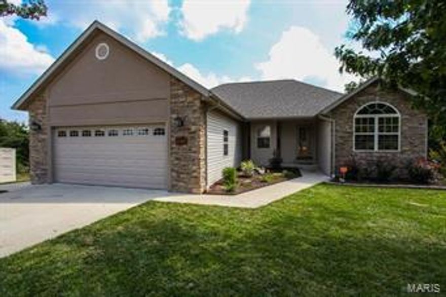 Located in the Ridge Creek subdivision with over 3300sqft is this 6 bedroom 3 bathroom ranch-style home which sits on a full finished walkout basement. Enter the lavish living room which highlights laminate wood floors, vaulted ceilings and a gas fireplace. Next, step into the dining area and kitchen which feature ceramic tile floors, glass tile backsplash, huge bay window, walk-in pantry, stainless steel appliances and saddle brown cabinets with crown molding.  The spacious master bedroom features a trey ceiling with recessed lighting, a walk-in closet, while the floors are carpeted. The full master bath features ceramic tiled floors, corner jetted tub, a tiled separate shower and a double vanity sink. Head downstairs to the large family room which is great for entertaining friends and family. Find 3 more bedrooms on the lower level with the 6th bedroom not having a window.  Step out to the back deck and take pleasure in the fantastic view and landscaping. Call to schedule a showing!