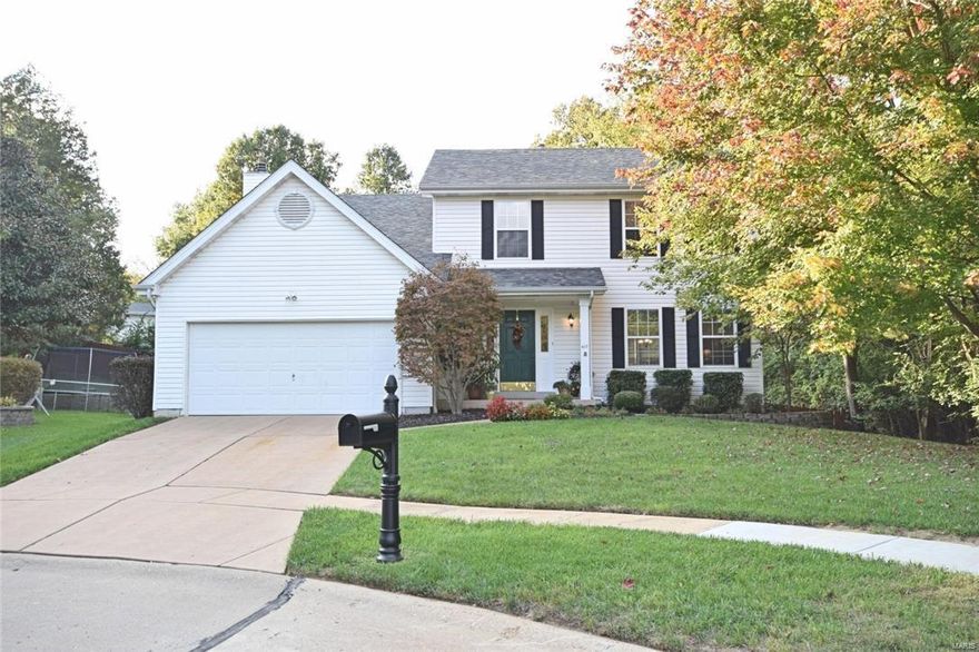 Wonderful 2 story on a beautiful tree lined lot that backs to common ground! This 4bed/3 bath home is nestled on a quiet cul-de-sac in the Rockwood School district! Kitchen has been recently updated to include granite countertops, tile backsplash (2016), newer smooth top range (2016), dishwasher and refrigerator. Gleaming hardwood floors throughout the kitchen continue into the family room complete with gas fireplace and bay window. Composite deck and stone patio overlook the large, private fenced in yard! Upstairs you’ll find a vaulted master suite with luxurious master bath complete with dual sinks, soaking tub, newer light fixtures, separate shower and walk in closet. Three spacious bedrooms and a large hall bath complete the upstairs.  Updates include vinyl siding (2015), roof (2015), updated lighting, and much more! Already inspected by the City of Ballwin. This home has been lovingly cared for and is move- in ready!