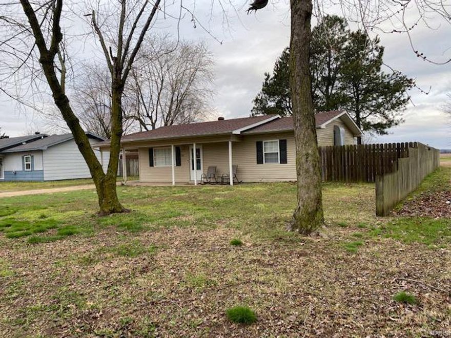 Home in a quiet neighborhood. Vinyl siding, shingle roof, one car carport attached. Laundry room with storage cabinet and tile flooring, Kitchen and dining area combo with tile flooring - appliances included are electric stove - microwave - dishwasher and garbage disposal, plus has patio doors that lead to a nice size yard with a concrete patio and enclosed by a wooden privacy fence plus storage shed. Living room has carpet floor covering along with the three bedrooms, one bathroom with tile floor covering. Home has thermopane windows and decorative doors to welcome company. Central heat and air and 5 ceilings fans.
** water heater installed 03/2022. All electric home.



This home is priced to move fast, so don't wait, call to schedule your private viewing today.
