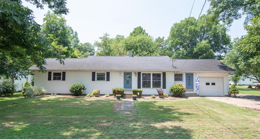 Say hello to this very nice, well maintained 3 bedroom 2 bath home with a 1 car garage in Oran, Missouri. As soon as you walk into the front door you'll be greeted by the spacious living room that sits right off the kitchen/dining area. The kitchen has plenty of custom cabinetry with a farmhouse feel. Down the hall you'll find the 3 bedrooms with plenty of space for your family. This home offers central heat and air all within the comfort of 1837 square feet of farmhouse living. Updates include a freshly remodeled, spacious bathroom, brand new AC and all new electrical, and security system that stays with the house. In the backyard you will find a shop to store all of your toys and tools. The shop also offers electric and heat/air. Schedule your private showing today!
Hallway bathroom vanity does not stay.