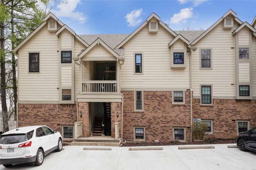 Beautifully updated ground-floor condo nestled in a park like community yet near all the amenities of the area. This move-in ready unit features newer flooring throughout, neutral paint, an updated kitchen with newer cabinets, granite counter tops and SS appliances (refrigerator included). The open-concept layout includes a spacious living room, a breakfast bar, and a bright dining area. Step out onto the covered deck—perfect for relaxing—with a storage closet and access from both the living room and the primary suite. The primary bedroom offers an en suite bath with a new vanity and in-unit washer/dryer (included). A 2nd bedroom and full bath with another newer vanity complete the space. Covered parking spot #65 with additional storage is included. Enjoy the community pool, plus unbeatable access to Creve Coeur Park's trails, lake, and amenities—just minutes from highways, rex-plex, shopping, and dining. Unit A is on the far left side of building 2212, located on the lower level. Location: Corner Location, End Unit, Lower Level, Suburban