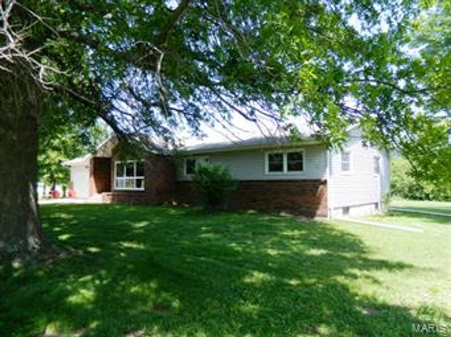 FANTASTIC FAMILY HOME ON THE EDGE OF TOWN!!! Very nice and spacious 3-4 bedroom ranch-style home at the city limits of Owensville! Well-maintained with newer windows and freshly painted. Main-level laundry, lots of closet and storage space. Lower level family room area with wood-burning stove. Back patio and attached 2-car garage. Sits on almost 2 acres with many beautiful trees and landscaping, plus storage building. On blacktop street with city water and sewer. Seller is providing buyer with a one-year American Home Shield warranty plan. Convenient location and what a great place for raising a family!