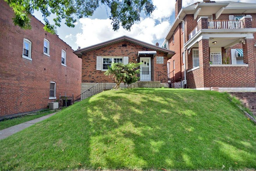 WOW! Step into this quaint, fully renovated 2 bed 1.5 bath home. New flooring and paint through out. The kitchen boasts with new cabinets and appliances: microwave, dishwasher, and gas stove. The full renovated bath includes new vanity, sink, toilet, light fixtures and tiles. Enjoy a double closet in the bedrooms. There is dining room and living room combo. The large lower level walk out is partially finished with a half bath and storage space. The space can be finished for a second dwelling unit or a potential commercial space like an office. New electrical panel. Large level, fenced back yard and a 2 car garage. Must see!