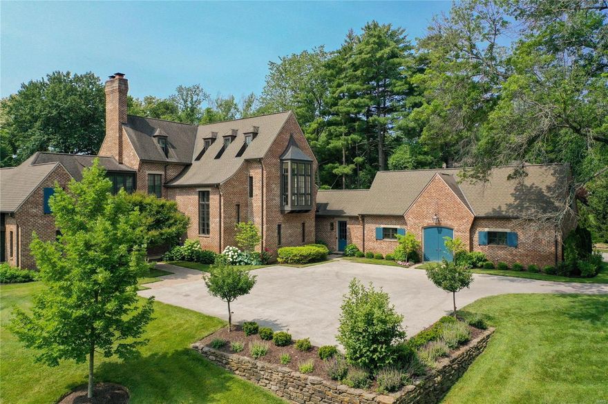 The quintessential Frontenac property you have been waiting for. This home is an architectural masterpiece built by Bobby McAlpine in 2007. Nestled in picturesque Countryside, this beautiful home is situated on professionally landscaped 1.45 acres that backs to Mercy Retreat. This is more than a custom home, it is a true testament to the McAlpine architectural design philosophy of seamlessly combining the elements of balance, symmetry & style. Creatively designed with 7 bdrms/7 baths including guest house with a master suite & mini kitchen cozy enough that you’ll have a hard time getting guests to leave. The charming covered breezeway with custom millwork & wood-burning fireplace adjoins the main house & guest house and is just steps from the outdoor amenities including pool/pool house, hot tub & sport court. The spacious basement includes a large gym, rec space, theater, bedroom, and full bath. One must see to appreciate the details of this special McAlpine home! Additional Rooms: Mud Room COOL: 14 SEER+