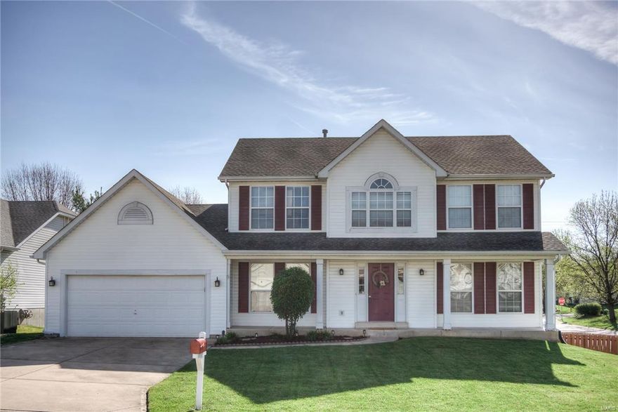 Welcome to this fantastic 4 bedroom, 2 full bath, 2 half bath two story located in the Oak Grove Bluff subdivision in St. Charles. This home boasts an open floor plan with a large family room featuring a gas fireplace plus a 5-bay window overlooking the deep fenced yard that includes a 20 X 16 wood deck that is great for entertaining. The attractive kitchen has granite, wood cabinetry, a butterfly island with breakfast bar, planning desk and a breakfast area. Main floor laundry and mud room is located off the kitchen. Then heading upstairs you will find a beautiful T-staircase to the upper level. Upstairs the master suite is huge with a sitting room/office and adjoining bath with double bowl vanity, soaking tub and separate shower. Three other bedrooms and a full bath complete the upstairs. The finished lower level features a wet bar with wood cabinets and counter, plus a half bath and MUCH MUCH More