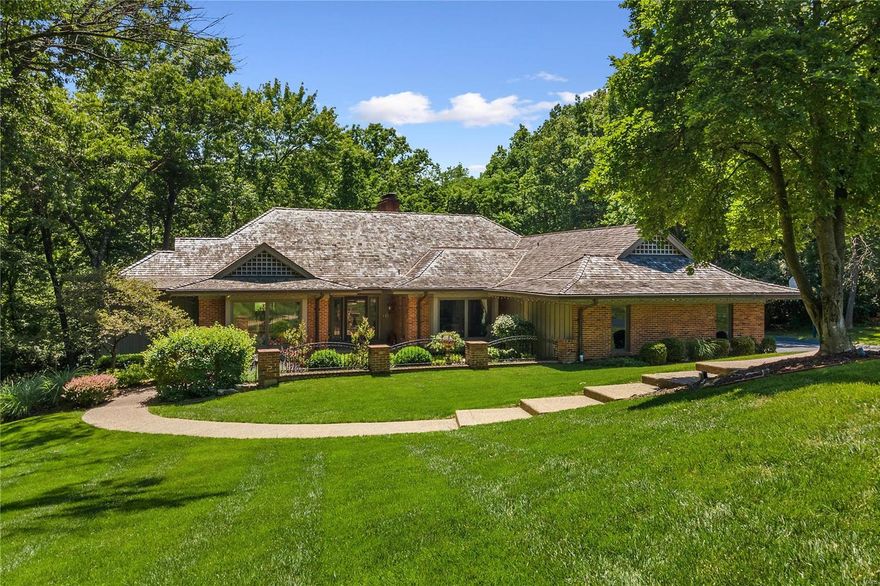 Exceptional 1.5+ acre setting with updated pool and backs to the lush Queeny Park! This ranch home is tucked in the back of the Kings Glen Subdivision on a cul-de-sac and has been lovingly maintained. Oversized entry leads to formal living & dining areas as well as the heart of the home - a hearth room opens to eat-in kitchen & surrounded by windows overlooking the pool and the vast park land in the rear. Step off the hearth room to a massive partially covered deck that feels like its floating in the dense forest. Main floor master suite & 3 additional bdrms plus 2 full baths in the walkout LL that lives and feels like the main. Oversized family room, game room and kitchen in the LL make entertaining around the pool a dream. This property is perfect for the discerning buyer looking for extreme privacy surrounded by 100's of acres of park land. Exceptional access to all that Town & Country has to offer, & adjacent to hospitals, schools & highways. Hop on the T&C trail system and enjoy!