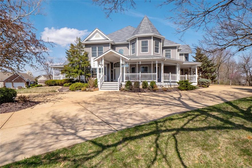 Extraordinary custom-built 1.5 story Victorian Estate home features 7500+ sq ft of upgraded & elevated living space enhanced w/ beautiful views from wrap around porches & patios on 1.5 acre corner lot + ample parking w/ 4 car attached garage AND detached 4 car garage or space for 2 RVs. Step into the grand 2-sty foyer which leads to the paneled den w/ built-ins, dining rm & spectacular 2-sty great rm w/ fireplace, bar w/ fridge drawers & palladian windows. State-of-the-art kitchen featuring custom cabinetry, granite counters, Viking appliances, butler’s pantry, & center island adjoins light-filled breakfast rm. Main floor master suite w/ renovated bath w/ 2 walk in closets & sitting rm offers a spa-like retreat. The 2nd floor extends the living quarters w/ 4 add'l bedrms, 3 baths & sitting rm. Incredible walk-out LL offers a rec rm w/ kitchen, family rm, & 2 bonus rms, one could be 6th bedroom. Live efficiently w/ Energy Saving Solar Panels & high efficiency appliances.