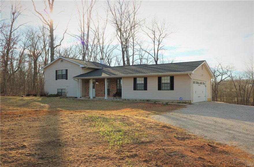 Home has been almost completely Remodeled!!! The new owner is being relocated for work, and unfortunately has to sell this home he's put his heart and soul into. This gorgeous multi-level home is on a wooded 3-acre lot in Wentzville School District! Home boasts an energy-saving Trane heat pump system installed new in 2015. You'll enjoy the open feel of the kitchen, dining room combo. There is a concrete patio off the kitchen which overlooks the amazing backyard! Lower level has a spacious family room with beautiful wood burning brick fireplace. This home offers an attached two-car garage insulated and dry-walled with new insulated door and new garage door opener. This amazing over 3 acre lot is absolutely gorgeous and provides all the privacy you want in any season! 375lbs of grass seed going down next week.