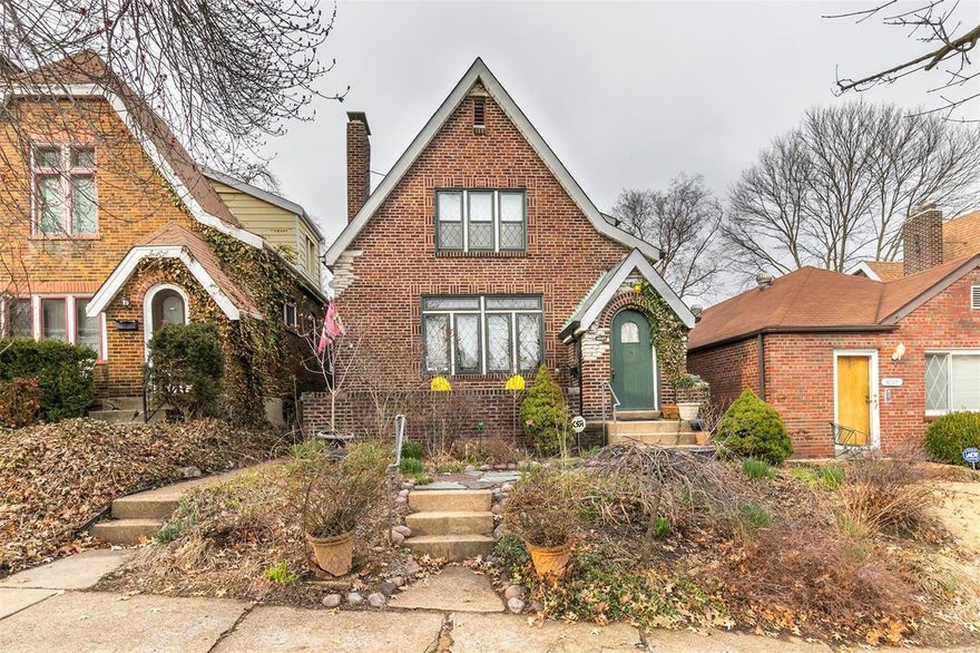 Est 1930:Dreaming of living in a jewel box with a fairytale butterfly garden? 4037 Parker defines the word charming. Enter the arched front door into the LR showcased by stunning original diamond-shaped leaded glass windows & Mediterranean-style FP flanked by built-in bookshelves. Wide arched doorway leads to separate DR with stained glass, just waiting to host holiday feasts. This kitchen! Vintage metal cabinets & gorgeous Vitrolite tile that harkens back to the 1920’s & 30’s. Upstairs find 2 generously sized bedrooms w/ huge closets. Incredibly hard to find in City homes! The large full bathroom features more Vitrolite of an incredible color. Truly an Art Deco dream. Hardwood floors & lovely natural light fill this house. Backyard has a great deck & level green space ready for BBQ’s & soft summer nights. 1 car garage makes parking & storage a breeze. Walkable lifestyle, close to Hartford Coffee, S. Grand, Tower Grove Park & more! Hurry, this beauty’s dance card will be filled fast!