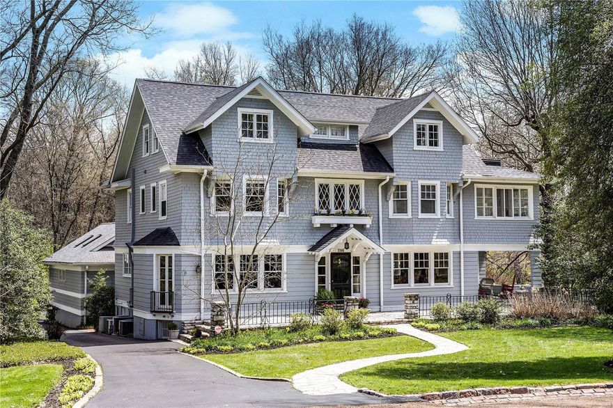 Stately New England style home sitting on over 1.5 acres in coveted Hampton Park. The timeless charm is never-ending between the unique millwork, hardwood floors, and gathering areas found throughout. A generous entry welcomes you into the stunning center hall. You will love the elegant living room with bright windows and fabulous space. The dining room is unique with incredible millwork and great space for a large dinner party. The eat-in kitchen has granite counter tops, double ovens, a gas cooktop, a built in dog bed cabinet, and hosts plenty of storage.  One of a kind basketball court/playroom can also double as a fabulous party room, and this spectacular space walks out to the beautiful pool patio complete with a gazebo and a pool bath. Second floor offers a large master suite with an updated bath and office.  There are 3 more bedrooms and a full bath found on this level. The third floor has two additional bedrooms and another full bath.  Prepare to fall in love! Additional Rooms: Sun Room