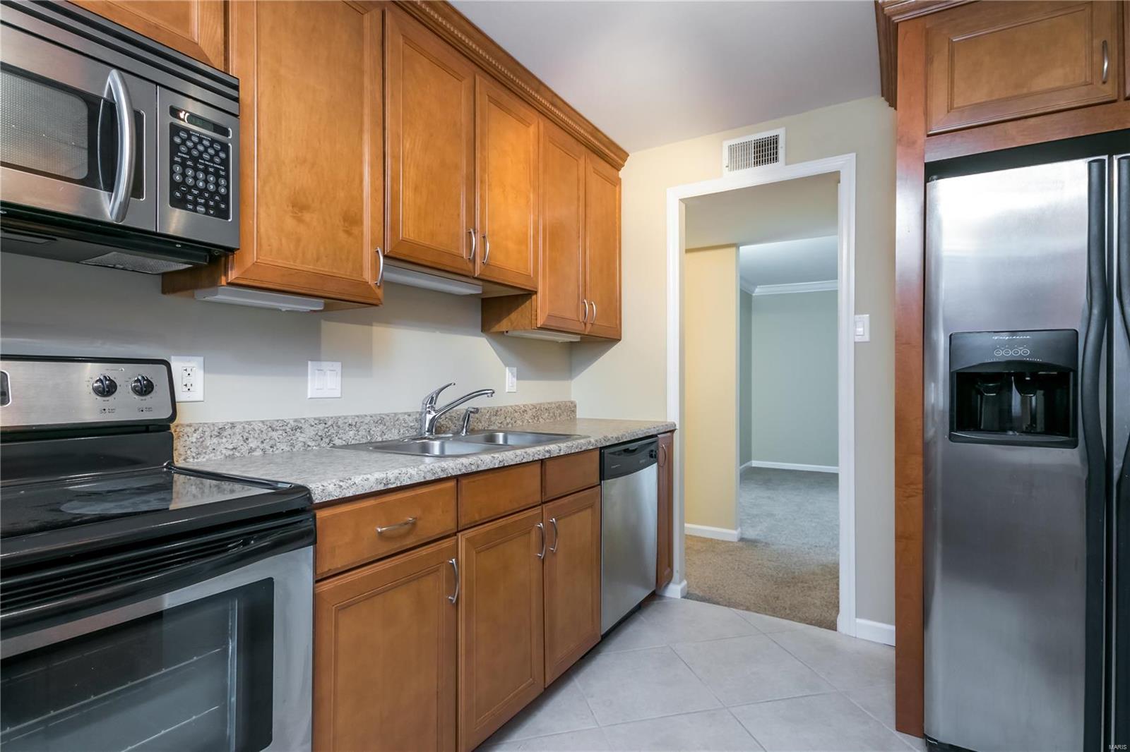 Carrollton Apts Unit 1 Condo - Residential