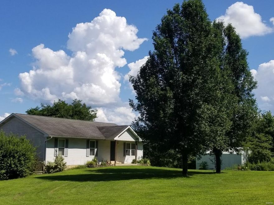 Looking for privacy and to be within 15 minutes of Hwy 21 and Hwy 55?  Secluded, 4+ park-like acres with level land, mature trees, a large pole barn, and located in the Hillsboro School District! Three bedroom, three bath home equipped with 9' ceilings in the finished lower level and an over-sized 2 car garage. Vaulted great room with open floor concept. This well loved home is ready for its new owners to put their personal and finishing touches on it!! Sold as is with seller to do no repairs or inspections.