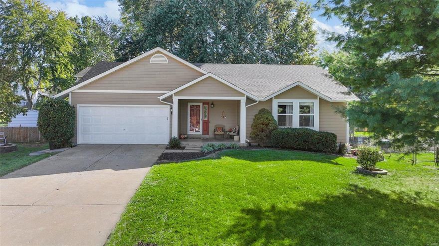 This beautiful ranch home is move in ready! Settled on a quiet cul de sac in Meadowridge Hills offering club pool, tennis and clubhouse in Francis Howell schools with easy convenience to shopping, restaurants and highways. This home is well maintained with newer upgraded James Hardie board siding, upgraded 6 panel doors & new baseboards throughout. The welcoming foyer opens into the huge vaulted great room w/great natural lighting and easy flow in the breakfast room and kitchen with SS appliances and granite counters. Down the hall to the master suite with walk in closet and full bath. The 2 secondary bedrms share the hall bath. A custom craftsman staircase lead to the finished LL with great LVP floors, rec rm, play area, egress window 4th bed/sleeping rm, laundry/utility rm and a great corner bar.. the perfect entertaining space! The backyard is fenced with mature landscaping and a deck. A newer roof, hvac, water heater, lighting and paint. Just unpack your boxes and you are home!
