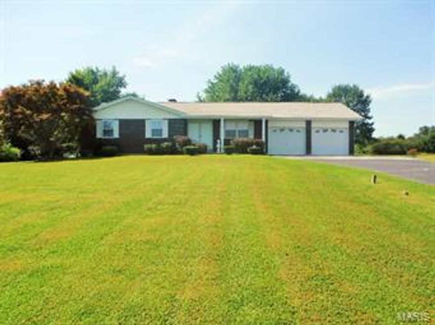 Very Clean- Well maintained home- 3bdr 2 full bath - Brick - Full basement that can be accessed from garage and home. 54x46 Shed/Garage with separate meter -100 amp service & w/b stove.  2 Horses are allowed. Beautiful 3.23 acres that has plenty of privacy with plenty of gorgeous trees including Apple and Pear trees -  Large Patio off GR for entertaining. Level Lot with partial fencing.  Asphalt driveway with extra parking.  Architectural Shingles.  Walk in Closets in Master and 2nd Bedroom with nice Hardwood floors.  Woodburning FP in Gr with open floor plan to kitchen and breakfast bar.  Separate Formal Dining room or can be used for Office/Den.  Great Location close to O'Fallon and easy access to hwy 61 north.