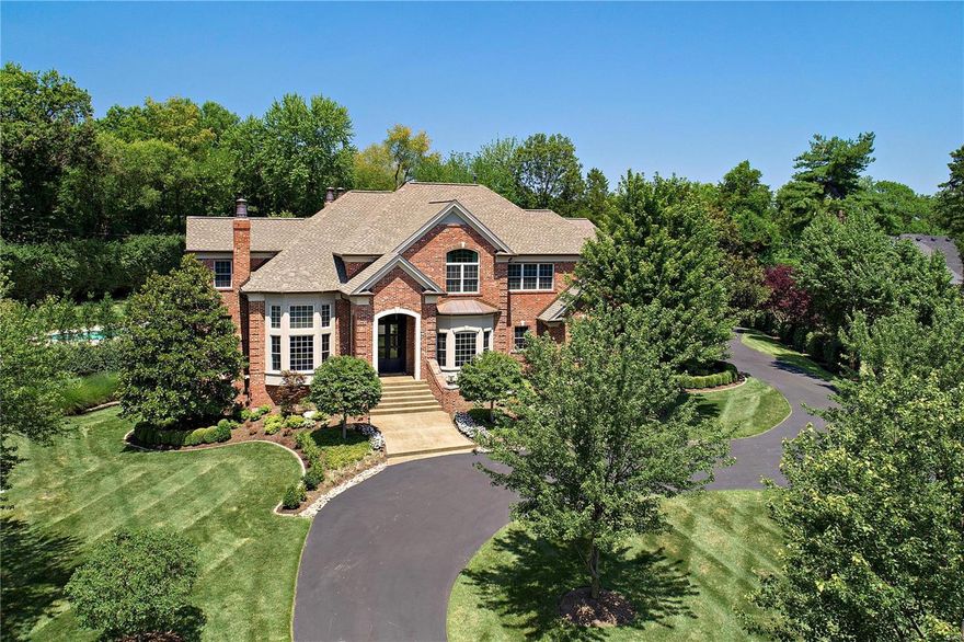 AGENT ONLY OPEN HOUSE 4/2/19.  This gorgeous home offers over 7,000 sq ft of luxury living and is situated on a private professionally landscaped 1.19 acre lot.  Boasting award winning kitchen and baths featuring Gegg custom cabinetry, designer fixtures and Wolf/Subzero appliances.  With a nod to the transitional and contemporary, find 10 ft ceilings on the first flr, rich hardwd flrs, 2 offices, mudrm, laundry rm, and family rm opening to the extra large kitchen and butler’s pantry with access to the covered outdoor ‘living rm’ with wood beamed ceiling, stone fireplace & electronic screens.  Upstairs a luxury master suite with dressing rm adjoining his/her closets and luxury bath with steam shower.  2 bedrm suites, 1 with hall bath access, 4th bedrm, ‘rec rm’, laundry rm & exercise rm w/private full bath complete the 2nd flr.  Media rm, rec rm, game rm and kitchenette are found in the walkout low lev. Renovated salt water pool, 5 garage spaces & more Additional Rooms: Mud Room