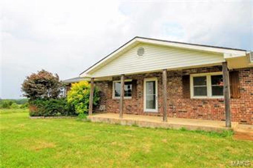 LARGE HOME THAT SITS ON APPROXIMATELY 43 ACRES! Perfect for hunting land! This home is in a great location that has perfect views and a peaceful atmosphere. Featuring 5 large bedrooms, 3 full bathrooms, 2 family rooms, and a perfectly sized kitchen and dining room area. The living room on the main floor has a STUNNING gas fireplace and a brick accent wall, the kitchen is open and has great space, the bedrooms are wonderfully sized and the master bathroom has been completely updated. The homeowners are currently in the process of renovating areas on the inside of the home. There is 2 utility sheds in the back of the home that would be great for storage. If your looking for country living, this home would be a perfect fit. Give us a call to schedule a showing today!