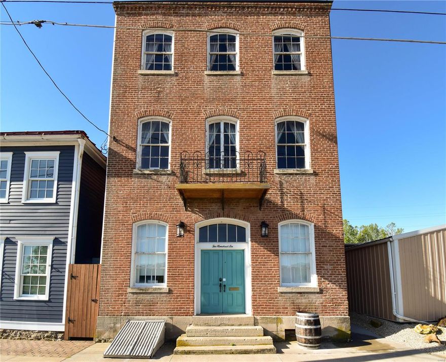 Three story, three unit guesthouse on the riverfront in Hermann, Mo.  Immaculate, Turnkey guest house with new mattresses, new pillows, linens and bedding. C1 zoning.  These units are set up for groups and has strong demand with attractive location on the riverfront, next door to the Hermann Trolley. Sale includes all furniture, linens & bedding, and all other items to run this turnkey guesthouse. Location: Downtown