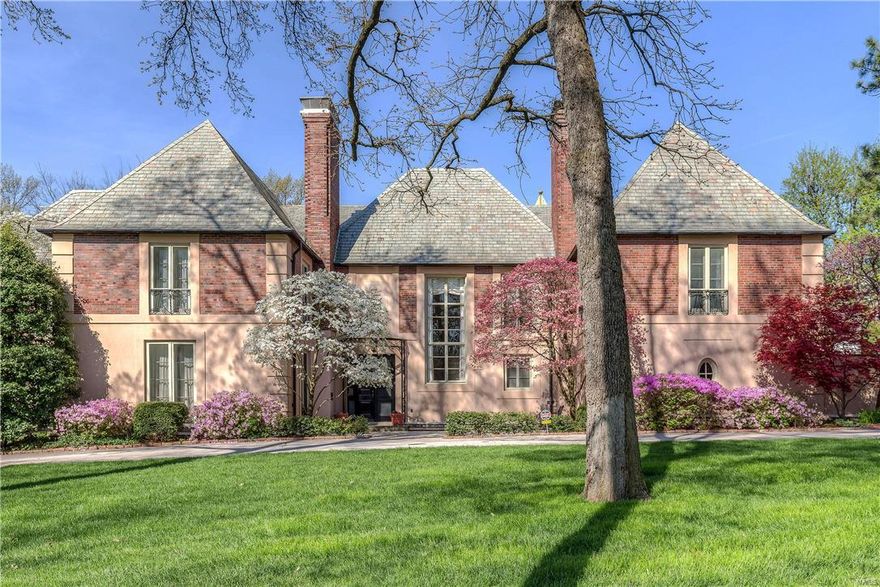 NEW PRICE & PHOTOS! Architecturally important Maritz and Young home in a neighborhood found on the National Record of Historic Places for landscape design by Jens Jenson! Impressive interior features incl wonderful high ceilings, arched doorways, terrazzo & hardwood floors, beautiful millwork, built-in cabinetry, wrought iron banisters. Large renovated kitchen opens to wonderful family room addition & casual dining area w tray ceiling, fireplace flanked by cabinetry, and 3 French doors opening to stone patio &  private back yard. The kitchen has center island w brkfst bar, undercounter microwv & warm drawer. Other features incl granite counters, Dacor dblovens, 48 inch SubZero refrig, Butler's Pantry, U Line bev cooler & xtra storage. Main flr laundry. Upstairs find 6 BRs & 4 full baths. Recently renovated master bath is fabulous w white cabs, carrara marble, sep shower, tub & dbl sinks. Lg walk-in closet plumbed for W/D. 3 car gar, private pool, patios, back up generator.OPEN SUN 6/18