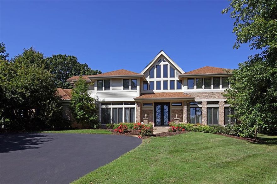 $50,000 REDUCTION! Ladue Schools w prime Creve Coeur location. Private, Level Lot with more than 30 Trees, on more than 7/10 acre.  3 Bedrooms have New Carpet (12/26/17).  4 Bedroom, 7 Bath home has a Designer Chandelier that showcases the Foyer, w/ Custom, Real Wood flooring, cathedral ceilings and stone fireplace. Top of the line Chef’s Kitchen with many amenities, upgraded built in appliances, 6 ft Sub Zero Fridge, Ice Maker, Serving Island, newly remodeled walk in pantry, custom lighting, New marble flooring, opening up to the sunroom.   Mn Flr Guest suite, w/ new carpet and updated, tiled bath with granite.  Upstairs Mstr Suite has private sitting room, spa bathroom w/ raw wood cabinets, jetted tub, and glass tile surround.  Library w/ extensive built ins.  Two more bedrooms, one w/ NEW carpet, tiled, updated bathrooms, one w/ granite.  Finished LL w/ Fam Rm,  Kitchen/Bar, Sleeping Area/Office, and Full Bath.  5100 TLA, 3800 abv. Non Smoking and Pet Free.  New High Efficiency AC.
