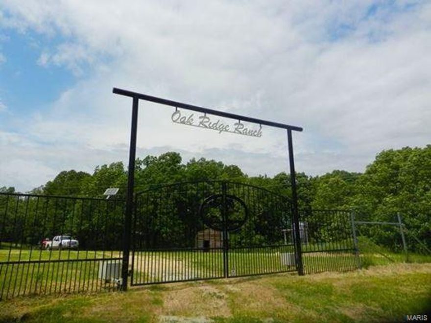 Oak Ridge Ranch nestled in the heart of the Ozarks located on a private road–Droptine Ln in Camden County, Mack’s Creek, MO. 784 acres of hard woods, natural grass prairies, ponds, spring, wet weather creeks & private seclusion.  596 acres is enclosed in a high fence & the remaining is in free roam Ozark rich game territory. The high fence was built by J4 Fencing - El Campo, TX. (http://www.j4fs.com/).  Rolling fields, strategically placed ponds, path system throughout the property, wooded draws, subtle elevation, mature timber, berry bushes & native flowers give plenty of natural habitat for the herds.  February of 2018 MDC estimated 200 deer (5+ 200"+) & 35+ elk on the ranch.  Will not last long at ONLY $1,250,000 offering 784+/- Private acres, 1 beautiful cabin,  3 bedroom 2 bath lodge with a basement to add unlimited rooms, with 5 + miles of high fence 34 acres of 4’ fence, tractor with all implements, side by side, furniture/fixtures in cabin, feeders & more.  Turn key operation.