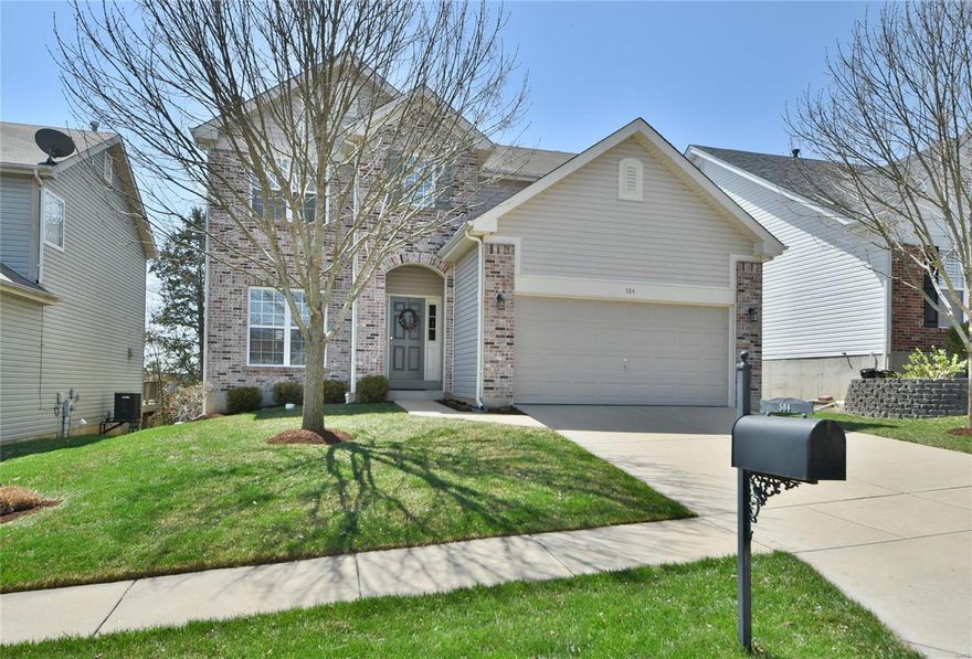 WOW! Can you say an AMAZING View? This one has it all! GORGEOUS 2-story model that's impeccable. AWESOME condition w/nice updates in this spacious 4-bedroom, 2.5 bath home that's move-in ready. Enter into the impressive entry foyer with a niche and hardwood flooring that flows naturally into a Chef's kitchen w/large open space including center island, breakfast area, custom cabinetry, stainless appliances, stone backsplash, pantry and beautiful wood flooring that looks out to a breath taking panoramic view of Meramec Valley perched upon a high bluff! The open kitchen concept complements the cozy family room w/gas fireplace and bay window that also offers the scenic view of the valley.  Large Master suite boasts a deep coffered ceiling, sitting nook, walk-in closet & a luxurious private bathroom with double sinks, jet tub & separate shower.  Three additional bedrooms w/full bath are wonderful living space on the 2nd level. Main floor laundry, 2-car garage, + in-ground sprinkler system.