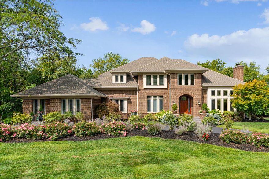 Through no fault of Seller, this exquisite home is available once again! Stunning modern home tucked in a tranquil, private setting, is a true sanctuary! The sophisticated first floor, features a gorgeous wood paneled library, airy two-story living room, intimate dining room, sumptuous primary suite, and an open, enormous kitchen, hearth room.  There are 3 exceptional outdoor spaces: two patios and a deck. Upstairs with 3 bedrooms, 2 bathrooms is fantastic space, while the lower-level apartment walks out and offers natural light, a stone fireplace, 2 bedrooms, and a full bathroom and kitchen! Other bonuses include new HVAC systems, tankless water heaters, water filtration system, and very new roof.  Three car oversized garage, plus extra driveway space for guests! Spread out and enjoy each room with a lovely view of trees, and green foliage, and lush landscaping!! Additional Rooms: Mud Room