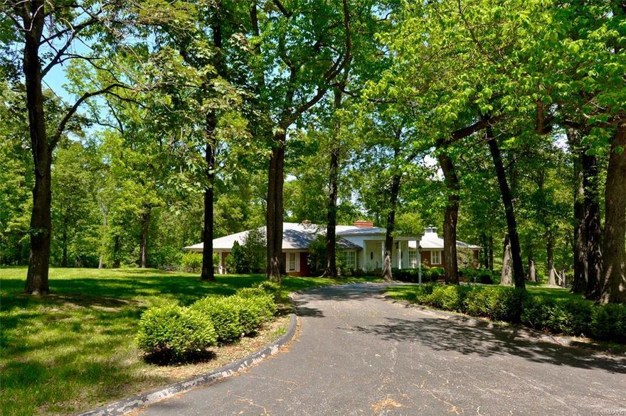 This premiere, private 3.5 acre lot, a one of a kind find within your reach to build your luxury dream home!  Distinguishing features include:  Secluded location off Litzsinger Road, adjacent to incredible, head-turning estate homes.  Beautiful mature trees and block out landscaping, with annotated varieties and location of species.  Large fenced area and a boundary survey with topo included.  A set of house plans that have been approved by the City of Ladue is available for new owner's consideration.  Private Gated Access to Hwy 40 * 10 minutes to airport! * Live near Ladue’s horse trails * Build it here!  Other reports are also available upon request.