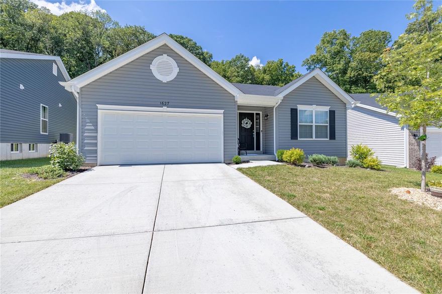 Immaculate two-year new build 3-bed, 2-bath home in Manors at Windswept Farms! This like-new gem boasts a spacious great room, dining area, and a beautifully designed kitchen, this open floorplan is perfect for entertaining. Enjoy the convenience of main floor laundry. The master suite offers a two closets including a walk-in on your way to the en suite bath. Fantastic tree lined location on a cul-de-sac in the back of the subdivision with no homes on the opposite side of the street for more privacy! Don't miss this opportunity to grab a newer construction home cheaper than you can build right now!