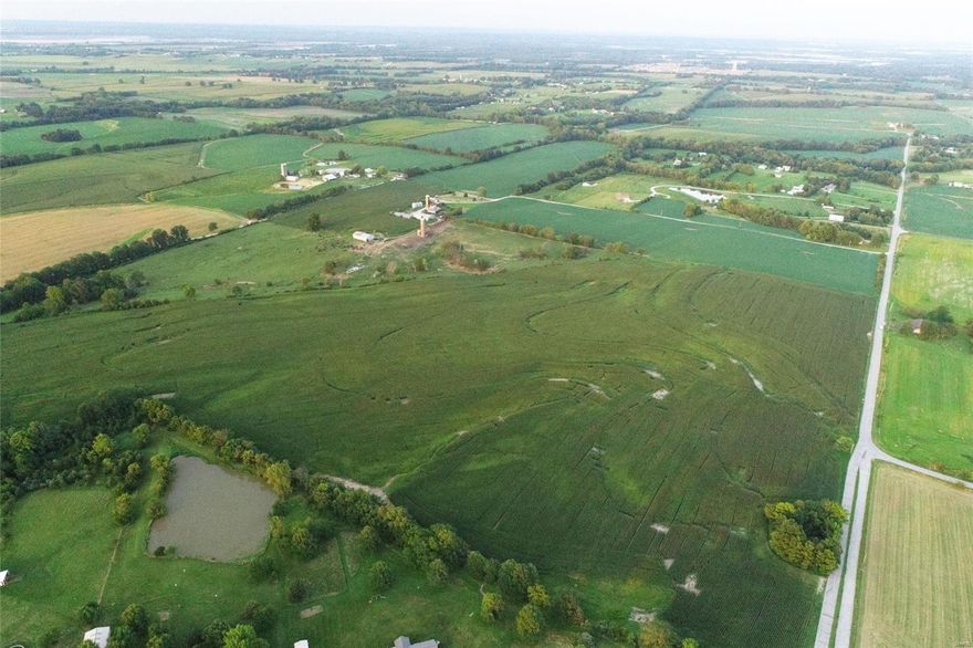 115 acres in St. Charles County offering numerous opportunities. Located just outside the city of O'Fallon and municipality of St. Paul, this flat, open tract serves as a great location for future residential development. Excellent access to the property with blacktop road frontage on Eisenbath Road. Farm is currently in row crop production and used for livestock.  Owners have had great success over the years hunting the property.  Very rare to find this amount of acreage together in St. Charles County. This tract is the remainder of a larger listing of 238 acres.