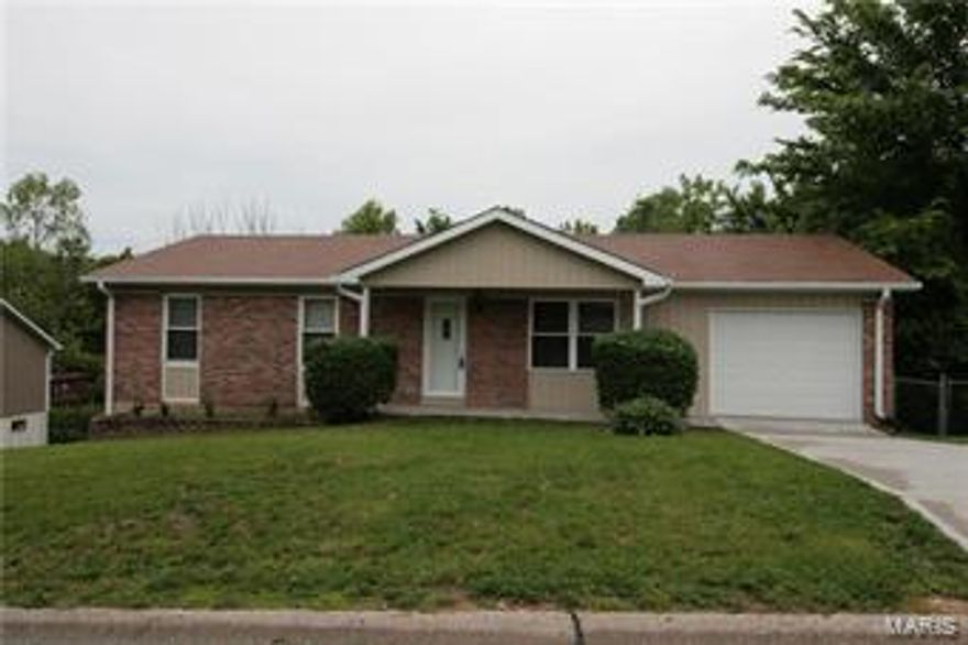 Nice 3 bedroom 2 bath home with large eat in kitchen and sliding glass door that leads out to nice deck over looking wooded backyard. Updated windows, roof, guttering, soffit and fascia. Home has a walkout lower level, on a corner lot, and backs to woods! Nice size 1 car garage, and updated driveway. Freshly painted and ready to it's new owner!