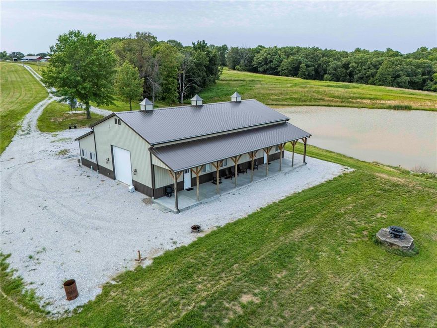 This 83.55-acre property is ideal for outdoor enthusiasts! It's a great opportunity to own a hunting, recreational, and hobby farm in Pike County. The newer Bardominium built in 2020 features 2 beds, 2.5 baths, and 2,050 sq ft of living space with an open floor plan and a large quartz kitchen island. The main floor includes a stone fireplace, living room, gaming area, spacious laundry w/ custom cabinets, and separate dining. Both bedrooms are on the main level, with additional sleeping space on the upper level. The attached insulated garage has storage space and a workshop. The home is on county water & septic. A spacious covered front porch overlooks a stocked pond and offers a great view of the farm. The property has 2 stocked ponds and a wet weather creek, with 19+/- acres currently planted in corn. It also includes 4 elevated blinds ready for hunting and a great trail system. This turnkey farm is an excellent opportunity for those in the market for Pike County Land.