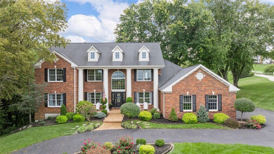 Classic, spacious 1.5 story home on an idyllic, private 1.37 acres in Chesterfield w/ sparkling, heated, saltwater pool.  Step onto the newer composite deck and imagine living here, it’s like being on vacation every day.  An entertainer’s paradise!   Just minutes from the Chesterfield Valley, while the setting makes you feel miles away.  Step inside to find 5200 + square feet w/ Brazilian wood floors plus main floor primary suite, gourmet kitchen and recently updated basement w/ concrete bar, and designer glass shelves.  Audiophiles will love the surround sound Sonos speakers in the basement and backyard. The upscale kitchen boasts Viking gas stove, Subzero fridge, a larger center island plus wet bar.  Enjoy the natural light in the great room w/ 18 foot ceilings, crown moulding and wall of windows, to take in the pristine setting.  Upstairs find 3 generous bedrooms, 1 w/en-suite, 2 more share a jack & jill and sitting room.  Highly-ranked Rockwood Schools incl.Chesterfield Elementary!