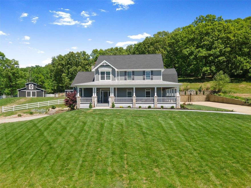 Luxuriously updated 1.5-story backing to beautiful 1,500 acre Rockwoods Range w/4-stall horse barn w/tack room & hay loft + a chicken coop! Nearly 8 acres includes fenced pastures & direct access to miles of wooded equestrian/hiking trails. Durable James Hardie siding & updated roof. Tall 10' ceilings & refinished wide-plank pine floors in main living area. Chef's kitchen w/granite counters, custom 42" cabinets, huge breakfast bar, walk-in pantry, & SS appliances, including high-end 6-burner gas range w/double ovens & pot-filler faucet. Updated composite deck. Main floor primary suite w/2 walk-in closets & renovated bath w/heated tile floors. 3-car side-entry garage w/12' ceilings w/flush mount openers & 2 electric car chargers. Upstairs bedrooms have walk-in closets & updated carpet + a rec room/office w/vaulted wood ceiling & wet bar. Finished 9' pour walk-out LL w/family room, bath & bedroom. High-efficiency zoned HVAC. Close to I-44. Rockwood (Eureka High) Schools. See it today! Additional Rooms: Mud Room