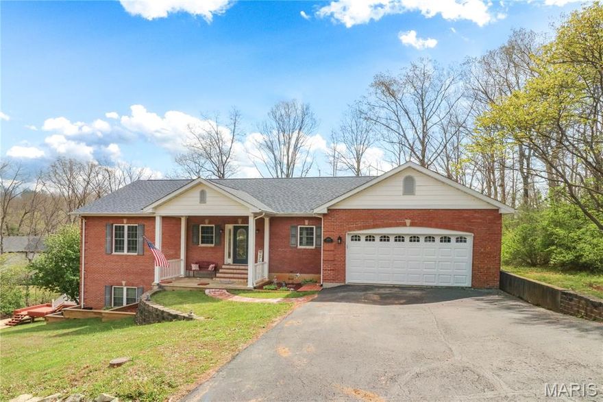 Welcome Home! Beautiful, partial brick 3-bedroom 3-bath ranch style home with a lake view of Lac Shayne in Terre Du Lac.  Home has an open floor plan with vaulted ceilings, wood floors, living room with a fireplace, spacious kitchen with ample cabinets including dining room area that walks out to one of the two decks. Main floor master suite includes walk-in closet, whirlpool tub and separate shower. Finished walkout basement provides plenty of room to entertain and a second fireplace. Home also features main floor laundry and central vacuum system. Home has been well maintained with a newer roof and HVAC.  This home is a must see to appreciate all it has to offer.   Terre Du Lac is approximately an hour south of St. Louis and offers 15 lakes, river access, dog park, park and an 18-hole golf course.