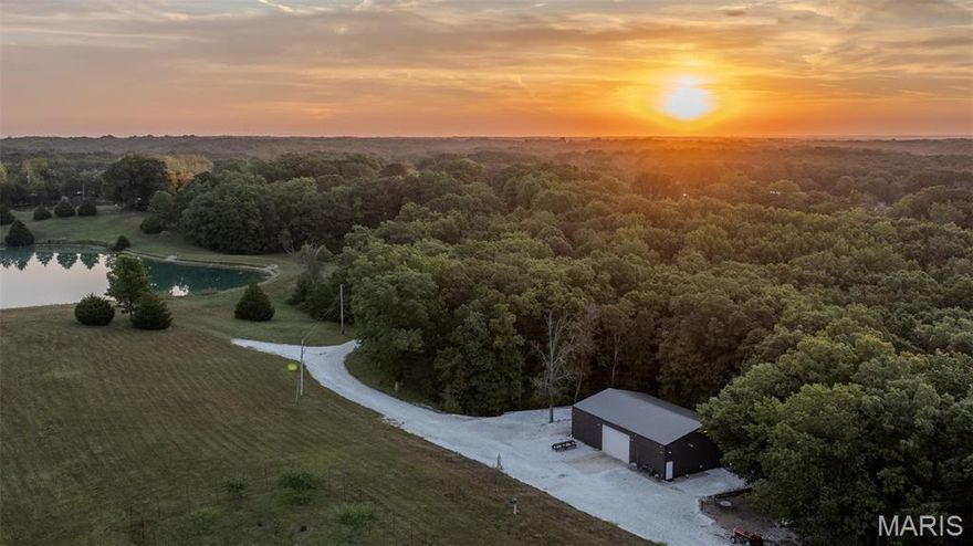 We are excited to present this spectacular recreational paradise located 3 miles south of Warrenton at the end of a dead-end road! These 54 surveyed acres consist of 30 acres of mature hardwoods, 4.5 total acres of water in 4 different bodies of water, remainder of acreage consists of open grassland that can be used for row crops, food plots or reestablishing the orchard. The 40 x 60 insulated shop is heated with a full kitchen, commercial stove/oven & sinks, and a diesel generator that is located inside which is set up so you can supply power to the shop whenever needed.

This property is one of a kind as you can enjoy it all year round.  Imagine being able to use a property from spring turkey season through the entire summer with awesome fishing & swimming into fall and winter with deer season and pulling family and friends through the snow in the open fields behind your ATV’s! This place is ready for all you can handle!

If your search has been for a homesite that is second to none with breathtaking views, you will be in love when you see what this farm has to offer. Pictures do not do this incredible property justice. It’s a MUST SEE!!!